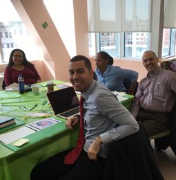 Educators working at tables during a workshop