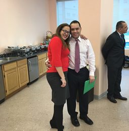 Educators talking in a school kitchen