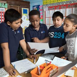 PS 294 students working together on a classroom project